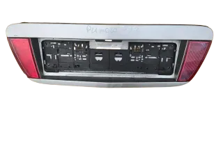 Nissan Primera P12 - Heckblende Kennzeichenausschnitt 90810AU400 - Bild 1